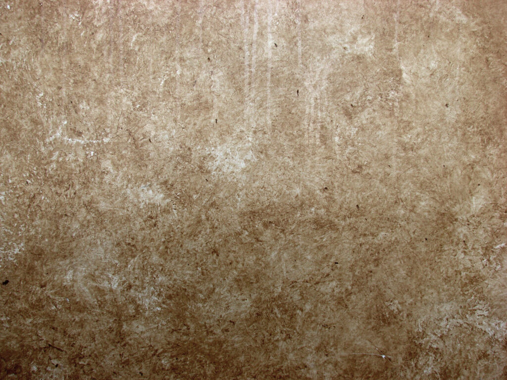 Abstractly Textured Brown Concrete Wall - Mesmerizing Background with Rough Surface Wallpaper