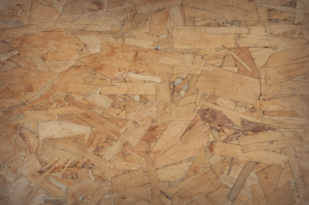Rustic Elegance: Light Brown Plywood Texture Wallpaper with Organic Wood Shavings Pattern