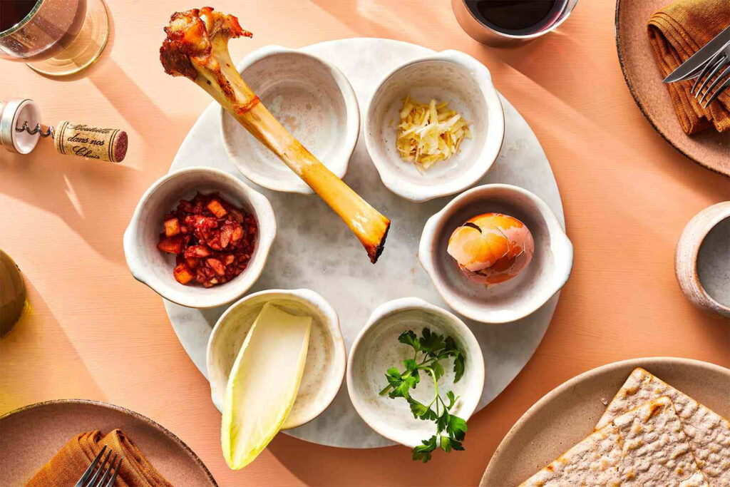 Elegant Rustic Food Table: Fresh Herbs, Cheese & Delicacies Wallpaper
