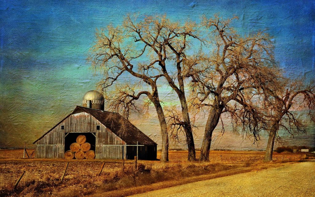 Rustic fall farm painting wallpaper with weathered barn hay bales and autumn harvest field