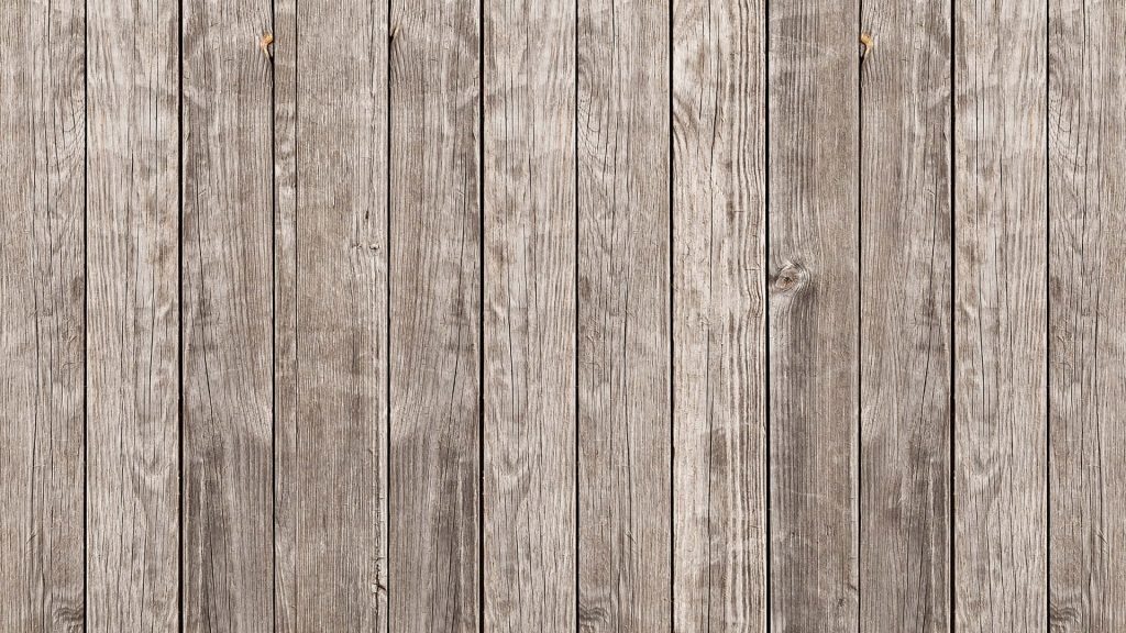 Weathered grey wood panel background with vertical planks rustic natural grain texture wallpaper
