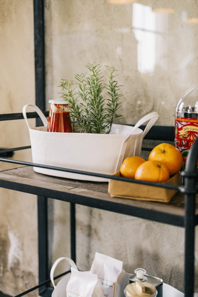 Rustic Shelf Arrangement: Fresh Oranges, Tomato Sauce & Rosemary Wallpaper