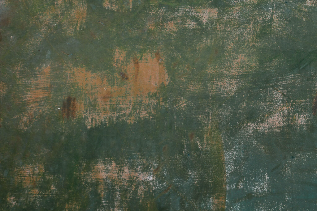Rustic Metallic Wallpaper: Aged Green and Brown Textured Background