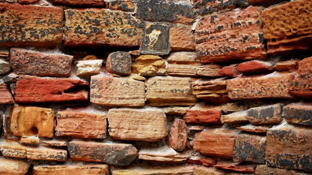 Rustic Red Brick Wallpaper Background: Authentic Weathered Texture