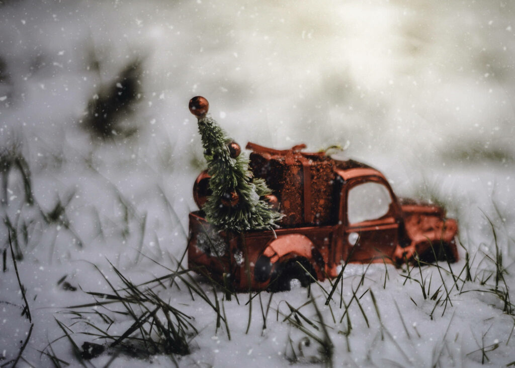 Rustic Red Truck with Christmas Tree Wallpaper - Cozy Winter Scene