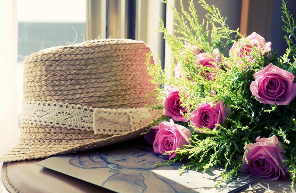 Serene Rustic Straw Hat with Lace & Pink Roses - Natural Light Background Wallpaper