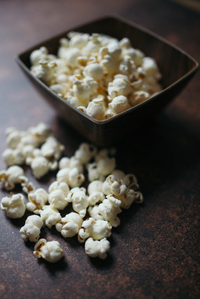 Rustic Wallpaper: Close-Up of Fresh Fluffy Popcorn Bowl