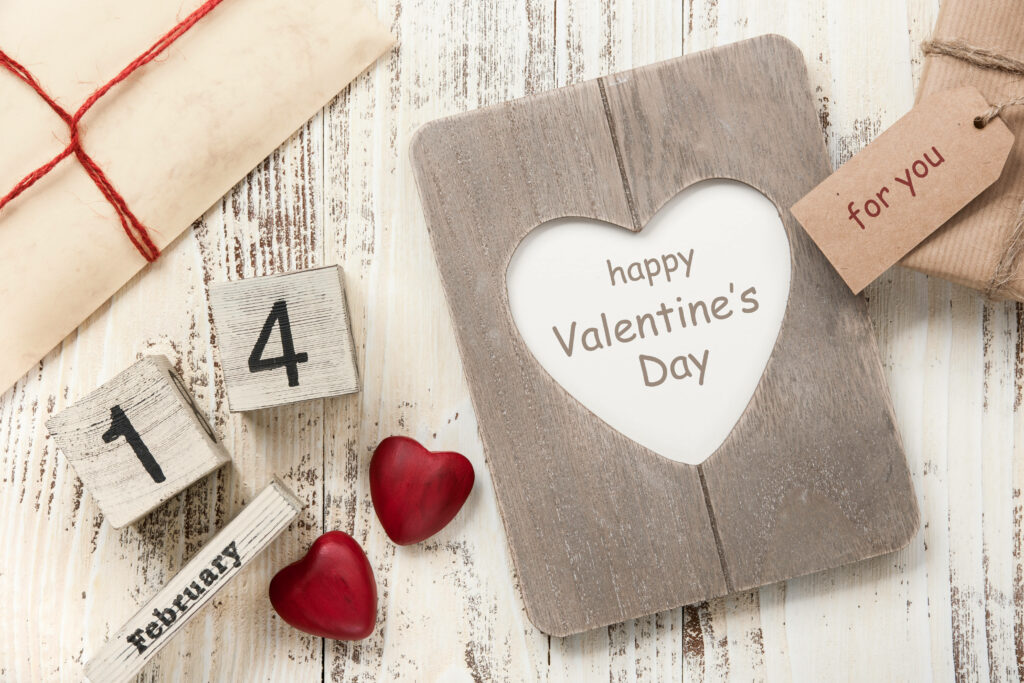 Valentines Day wallpaper rustic wooden heart frame February 14 gift and red heart decorations