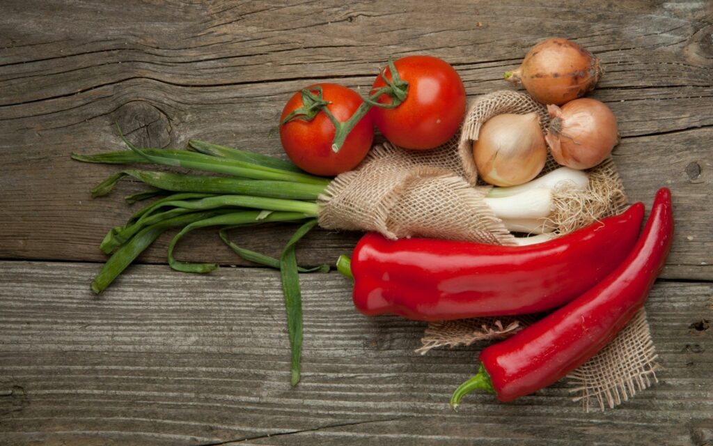 Rustic Vegetable Wallpaper: Fresh Peppers, Tomatoes & Garlic Aesthetic