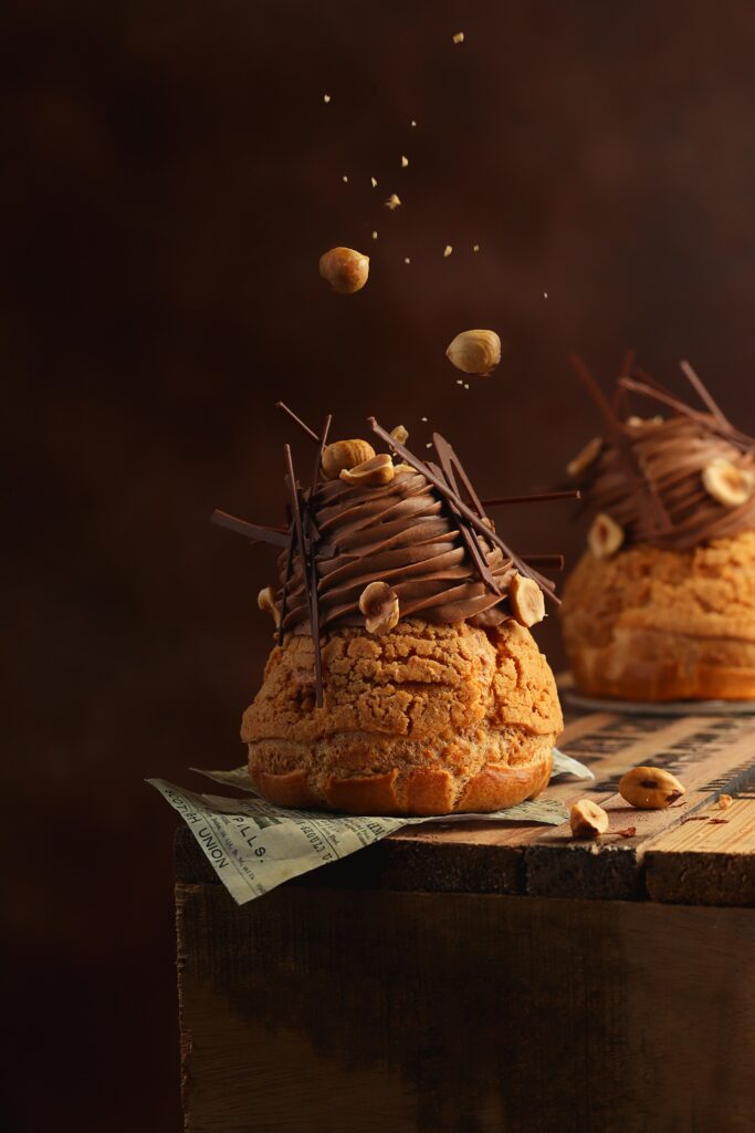 Charming Dessert Wallpaper: Cupcakes with Chocolate Swirls & Nuts