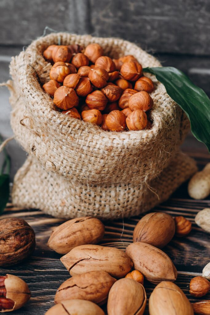 Rustic Burlap Bag with Fresh Hazelnuts - Rustic Wallpaper Background