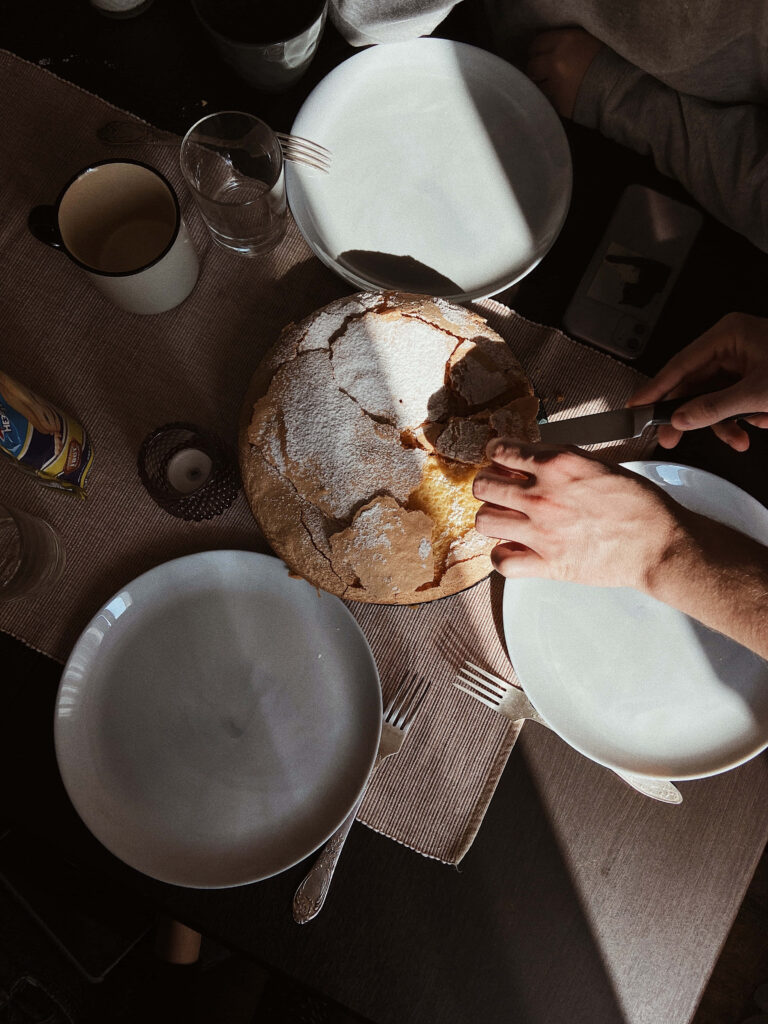 Rustic Wallpaper: Crusty Bread on Table for Warm Dining Atmosphere