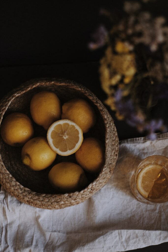 Rustic Wallpaper: Vibrant Yellow Lemons in a Natural Ambiance