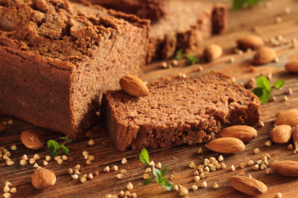 Rustic Wallpaper: Freshly Baked Bread & Crunchy Almonds Background