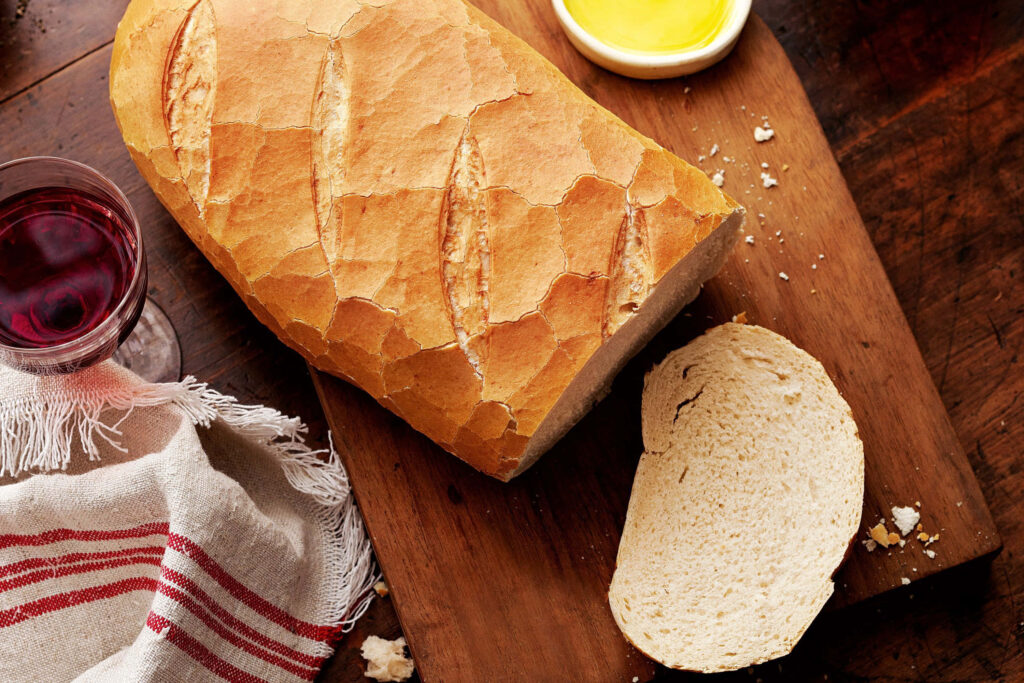 Rustic Wallpaper: Freshly Baked Crusty Bread & Red Wine Setting