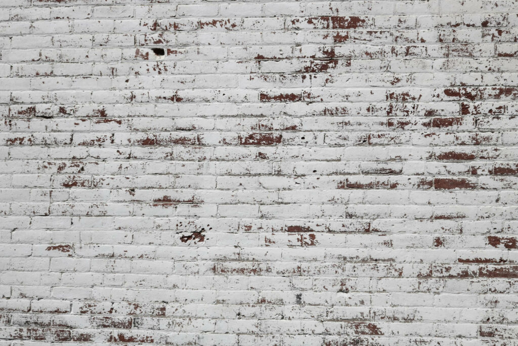 Vintage White Brick Wallpaper with Rustic Brown Texture Background