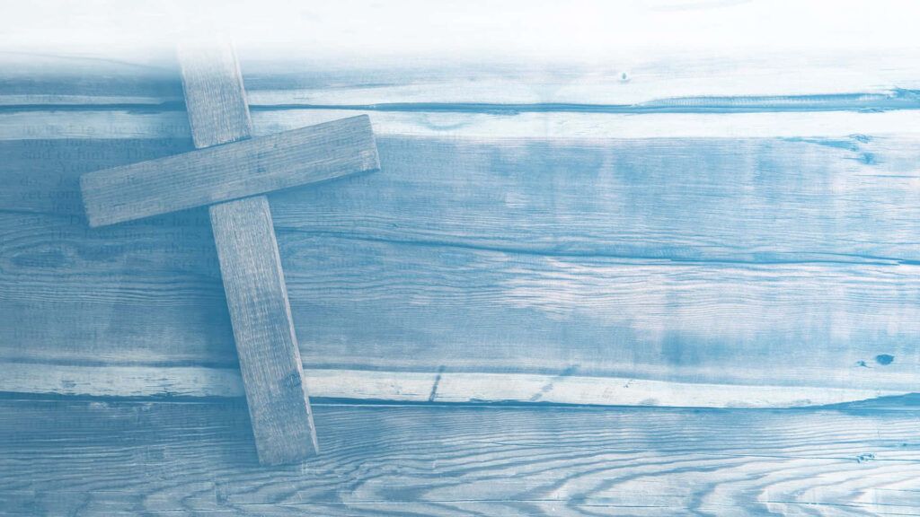 Rustic Wooden Cross Wallpaper with Soft Blue Tint Background