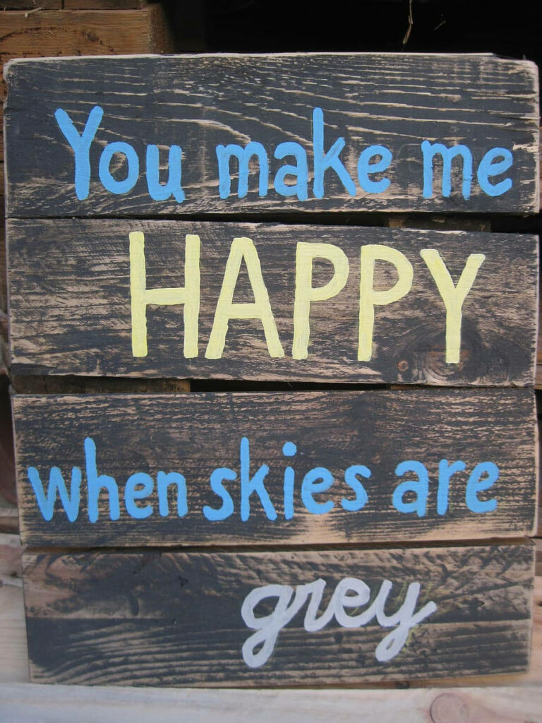 Rustic Wooden Wallpaper with Uplifting Quote in Vibrant Colors