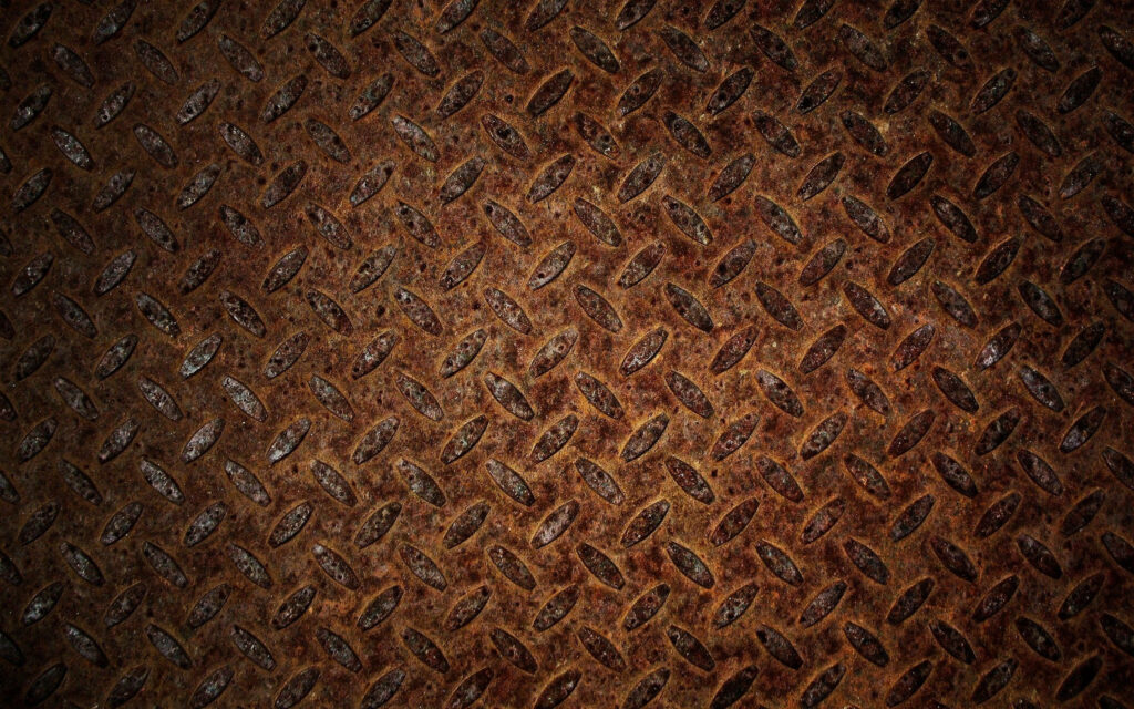 Rusty Diamond Plate Metal Sheet Wallpaper with Earthy Textures