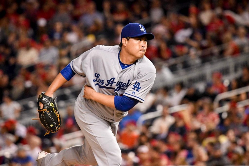 Ryu Hyun-jin pitching in Dodgers gray uniform dynamic MLB action with blurred stadium background Wallpaper