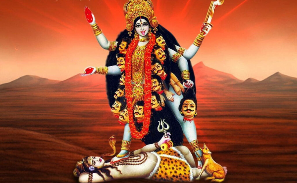 Powerful Maa Kali Overcomes Shiva in Fiery Desert Scenery Wallpaper