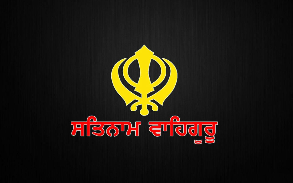 Harmony in Minimalism: Waheguru Symbol Shines Amongst Contrasting Colors for Desktop Bliss Wallpaper