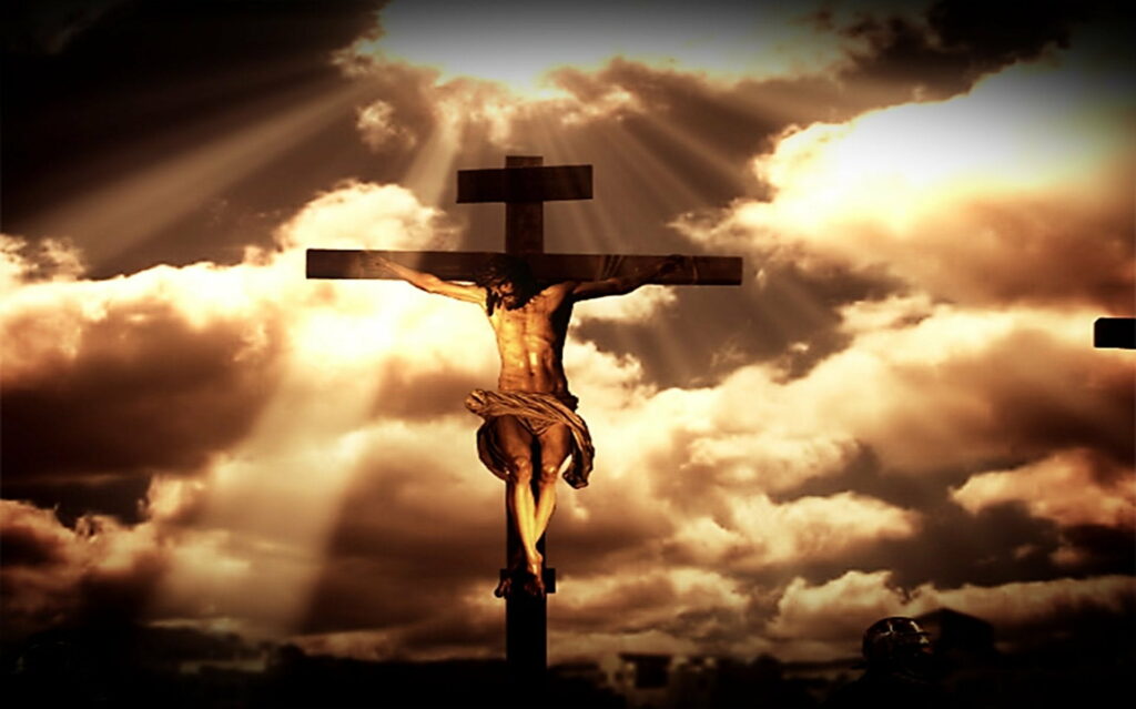 Sacred Serenity: Embracing the Divinity of Jesus in a Heavenly Cross Wallpaper
