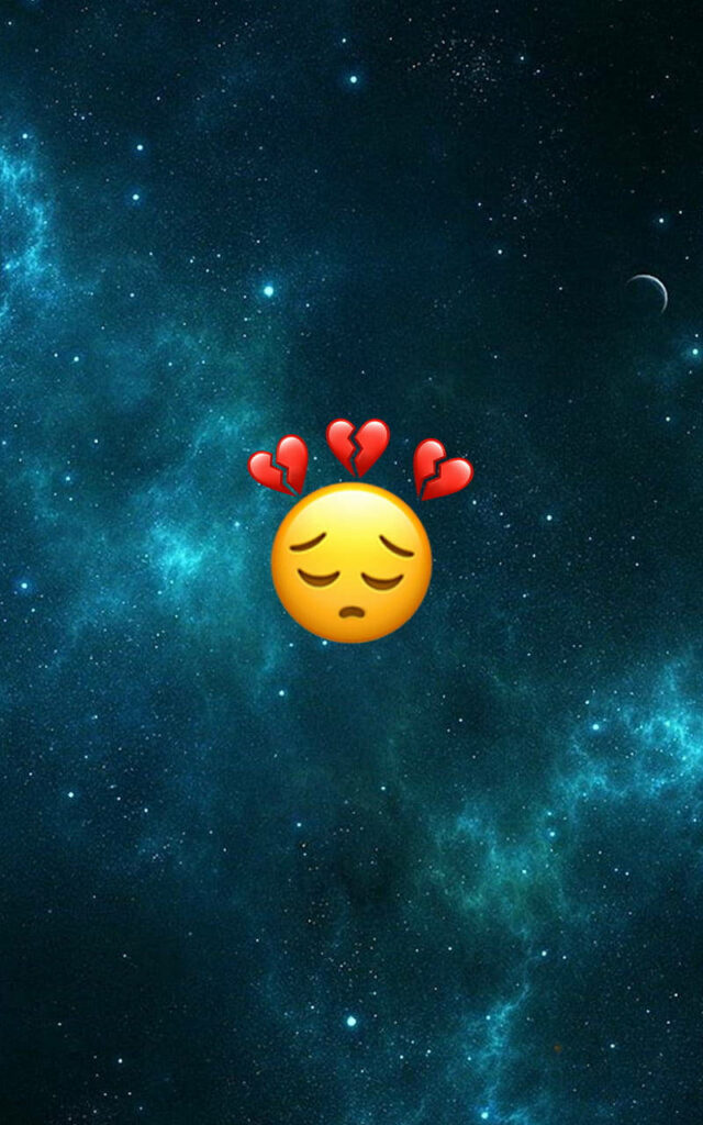 Sad emoji with closed eyes and three broken hearts on deep blue cosmic heartbreak wallpaper