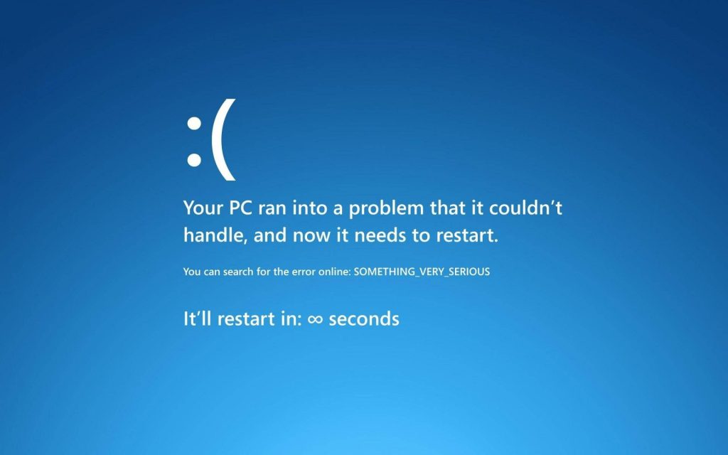 Minimalist blue screen of death wallpaper with sad emoticon and infinite restart message