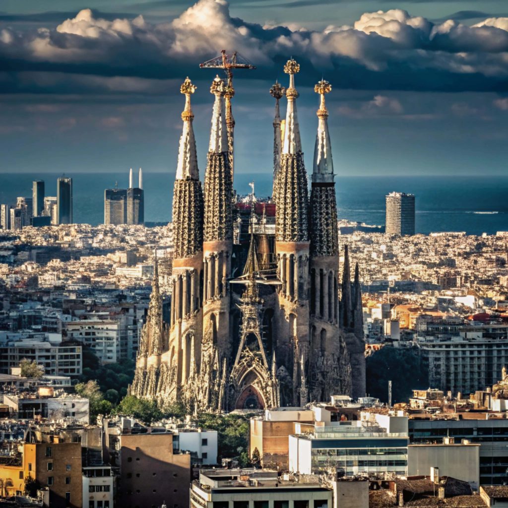 High-angle view of Sagrada Família Barcelona cathedral spires under construction with coastal skyline Wallpaper