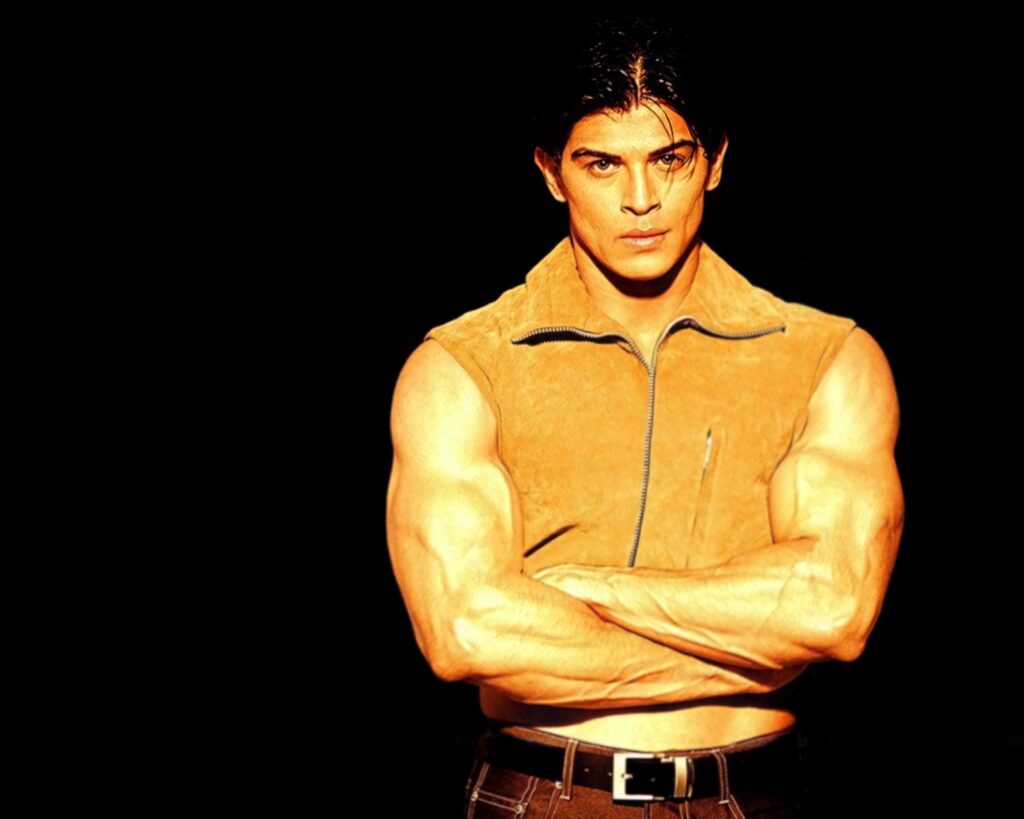 Sahil Khan muscular physique intense expression black background fitness wallpaper image