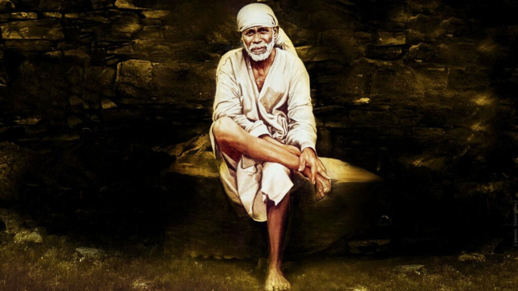 Divine Serenity: Sai Baba Sitting on the Big Rock - HD Wallpaper with a backdrop of sanctuary.