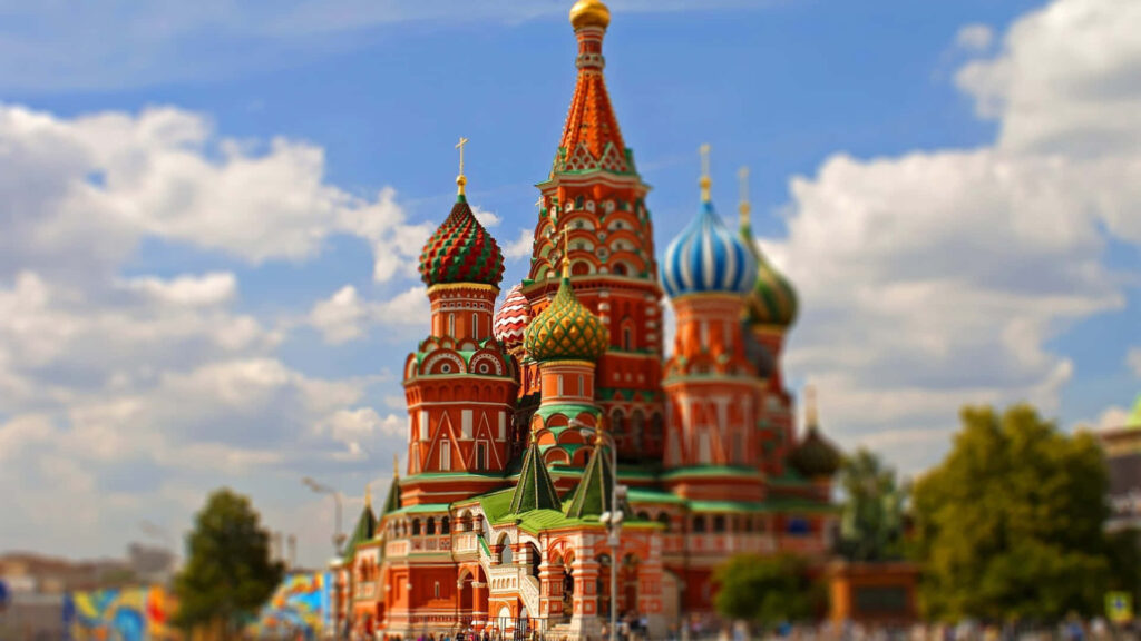 Saint Basil's Cathedral Moscow colorful domes architectural beauty under partly cloudy sky wallpaper