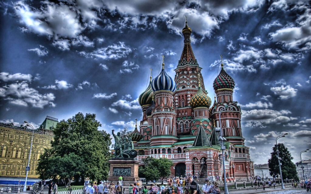HDR photo of Saint Basil's Cathedral Moscow with vibrant domes and dramatic cloudy sky wallpaper