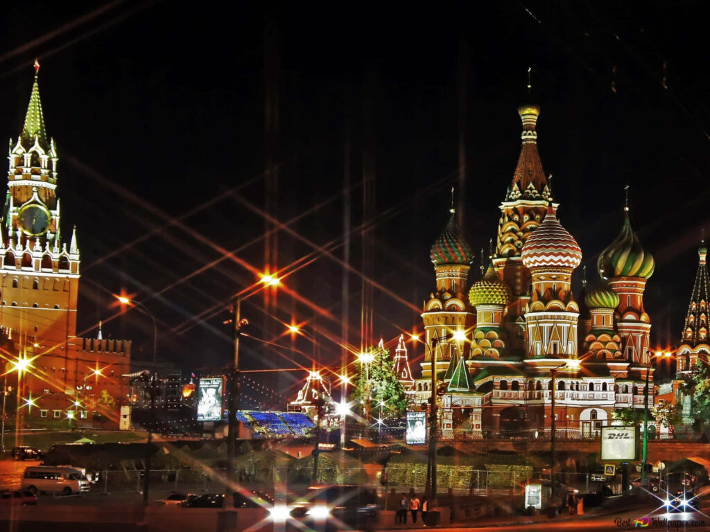 Saint Basil's Cathedral Moscow vibrant colorful domes illuminated at night city lights wallpaper