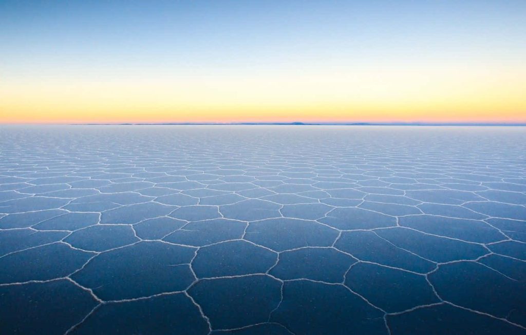 Salar de Uyuni salt flats Bolivia sunset hexagonal patterns serene landscape wallpaper view