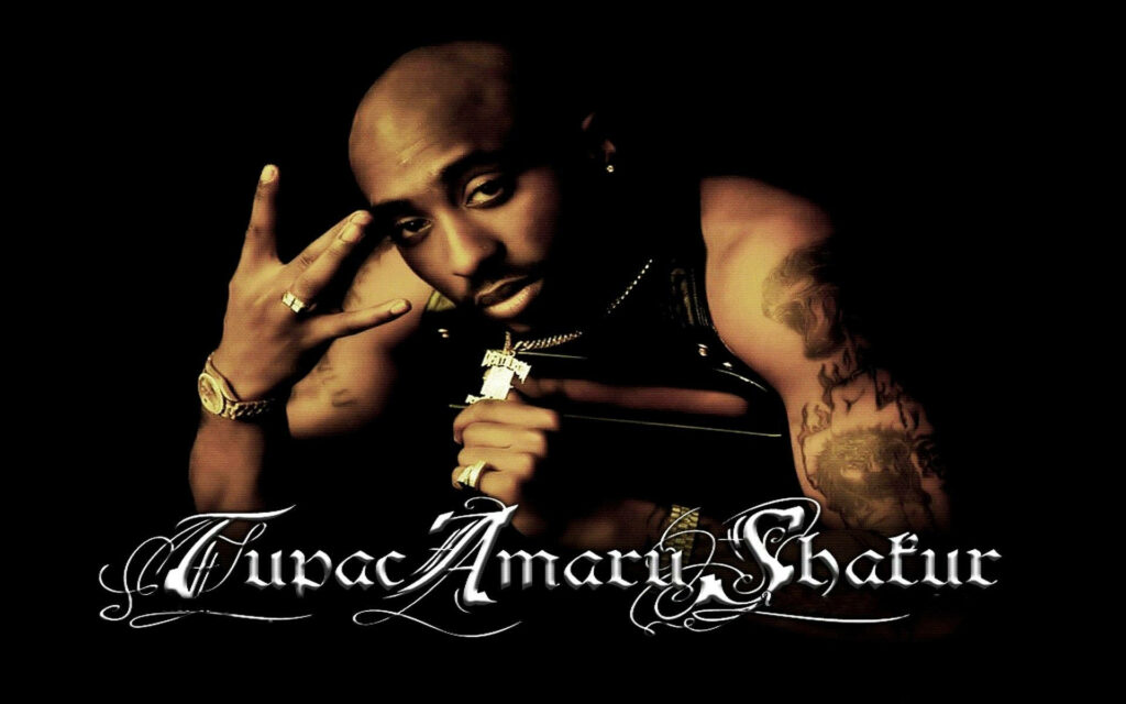 Remembering Tupac Shakur: A Captivating Glimpse into the Hip Hop Legend's Soul Wallpaper