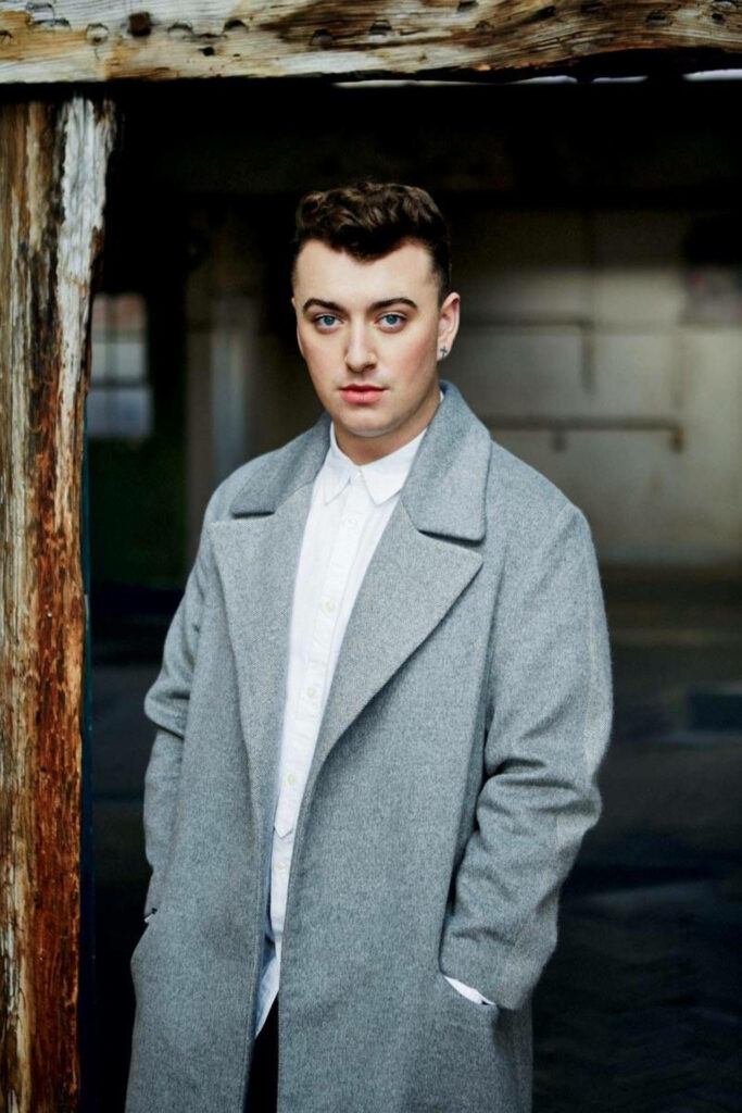 Sam Smith's Stylish Grey Coat: Timeless Sophistication Wallpaper