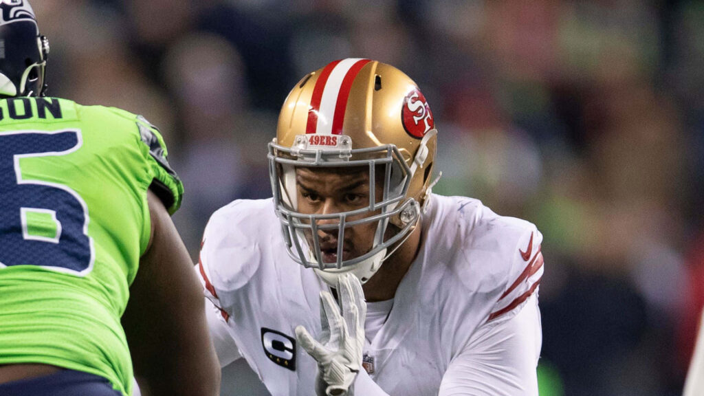 San Francisco 49ers Arik Armstead battles Seattle Seahawks player in intense NFL game action wallpaper