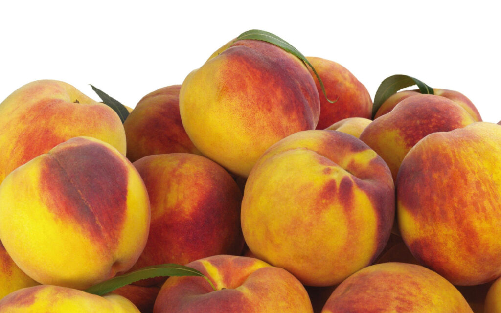 Harvest Bliss: Vibrant Yellow-Reddish Nectarine Fruit Wallpaper