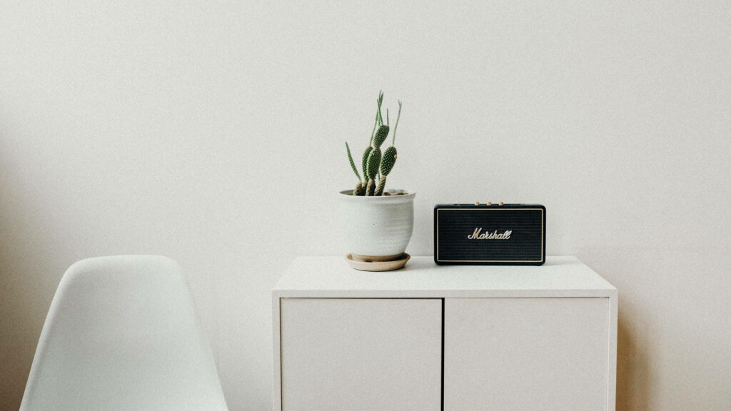 Scandinavian Charm: Transform Your Zoom Office with a Sideboard Table and Wallpaper