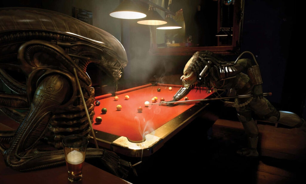 Scar from Alien Vs Predator playing intense billiards against an Alien in sci fi bar scene Wallpaper