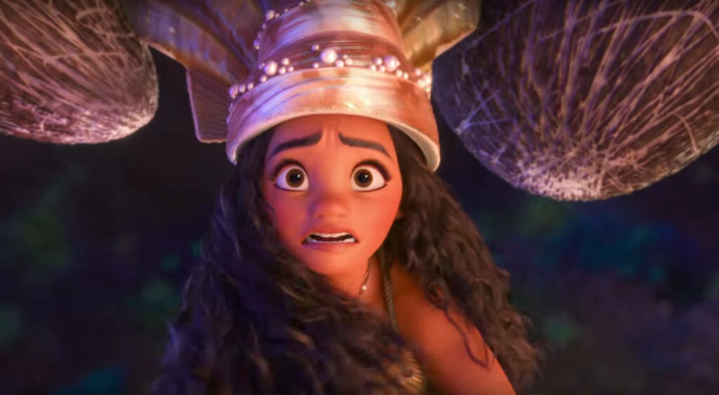 Moana's Scared Expression in Colorful Shell Hat Wallpaper Background