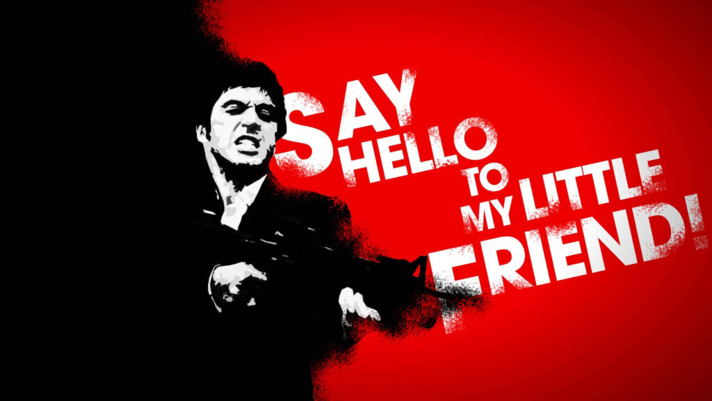 Scarface Tony Montana holding gun red background with Say hello to my little friend quote wallpaper