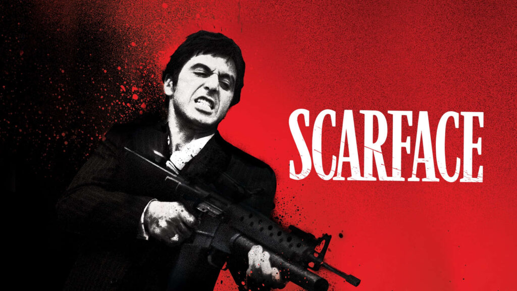 Scarface Al Pacino as Tony Montana holding weapon bold red background iconic film wallpaper