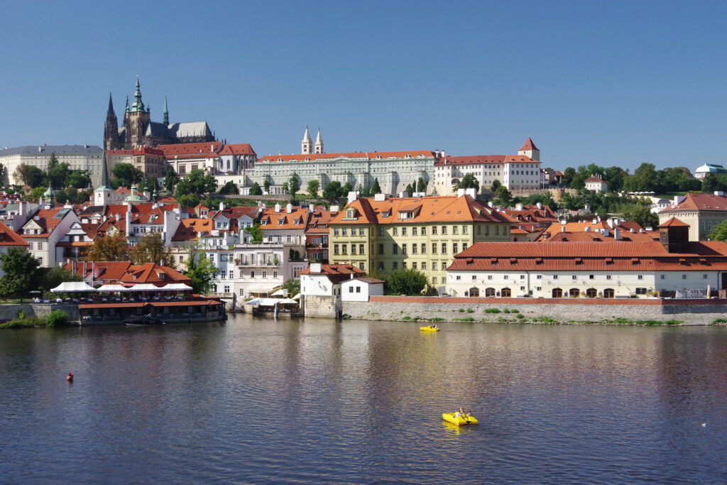 Scenic Cityscape Wallpaper: Historic Charm & Serene Waterfront