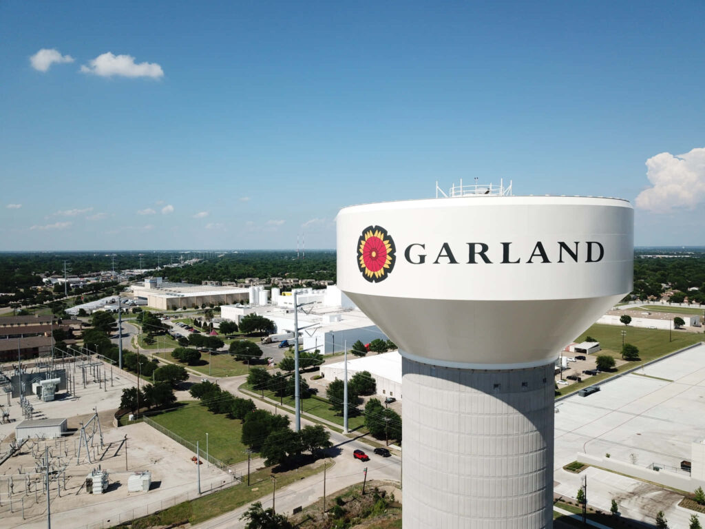 Scenic Garland Water Tower in Texas - Urban Landscape Wallpaper