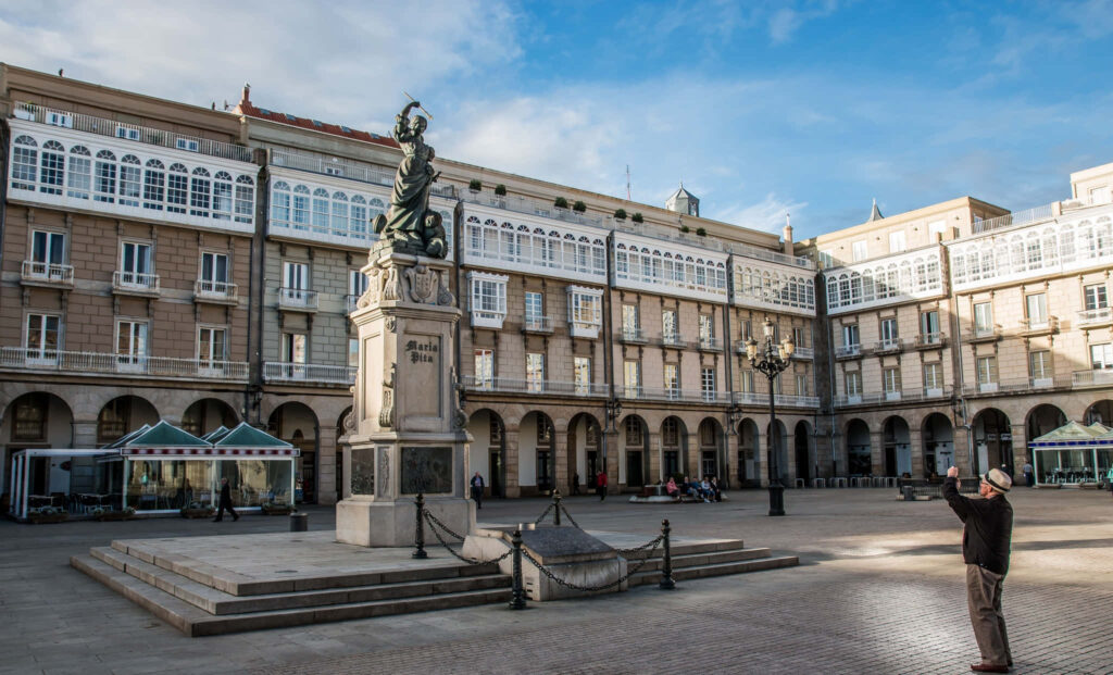 Scenic Maria Pita Square Wallpaper: Iconic Statue & Historic Charm