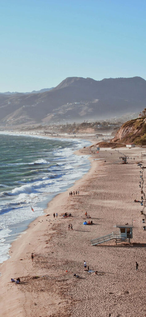 Scenic Point Dume Beach: Coastal Beauty and Serene Hills in Malibu Wallpaper