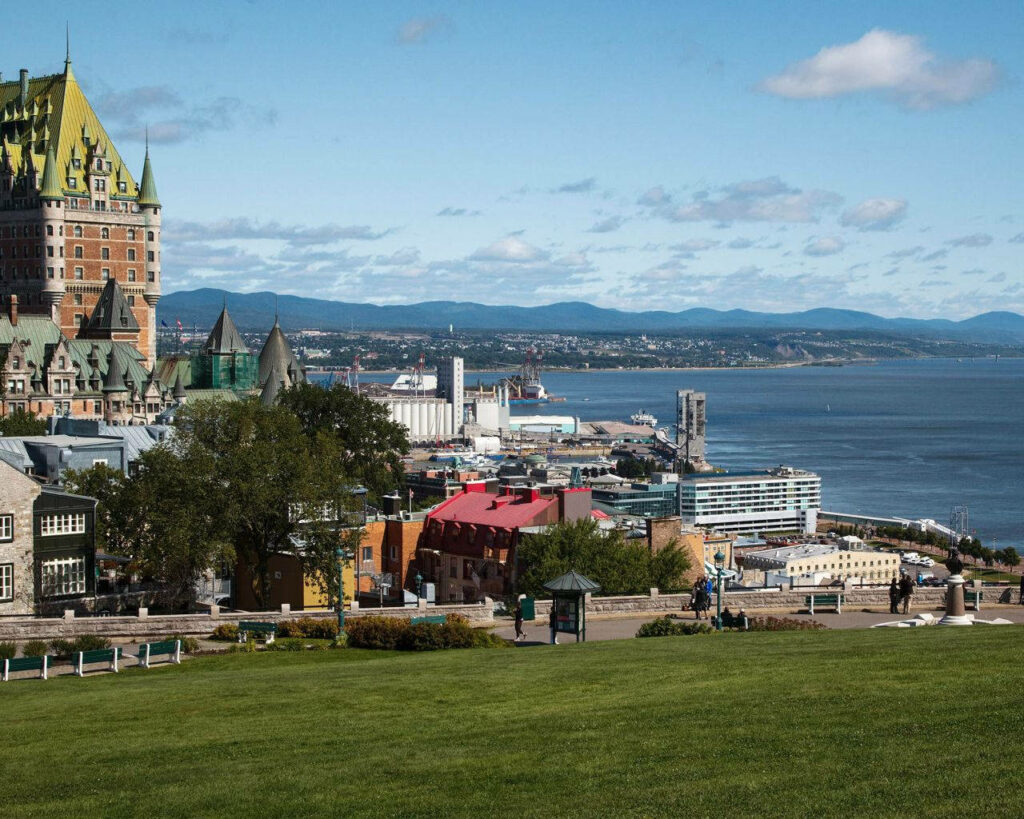 Scenic Quebec City Wallpaper: Lush Fields & Historic Architecture